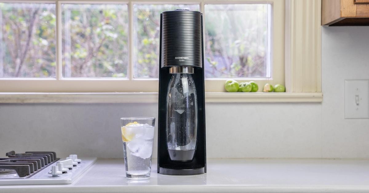 sodastream terra sparkling water maker with glass of sparkling water