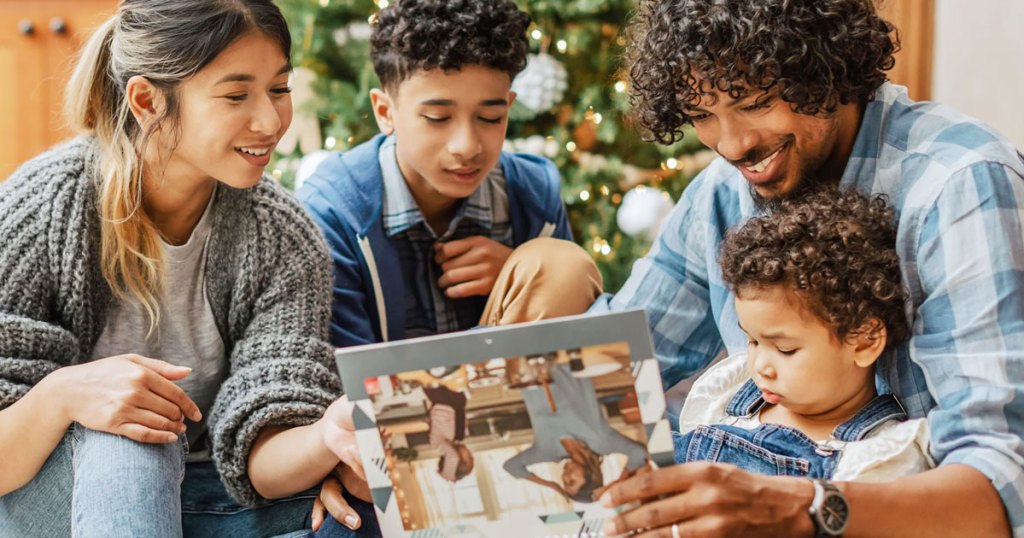 family looking at wall calendar together