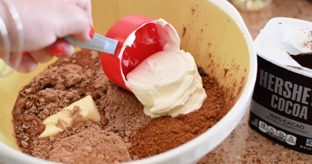 adding sour cream and cocoa powder to cake