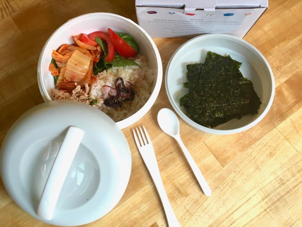 bowls on table with plastic ware