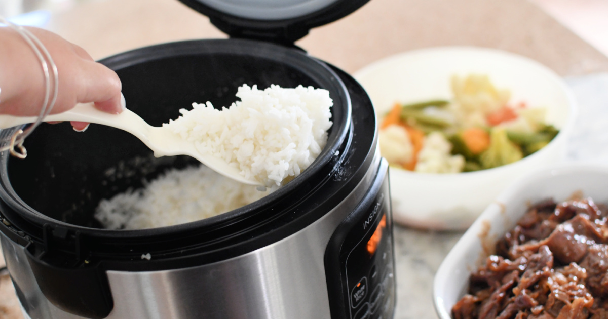 dishing up rice from insignia rice cooker