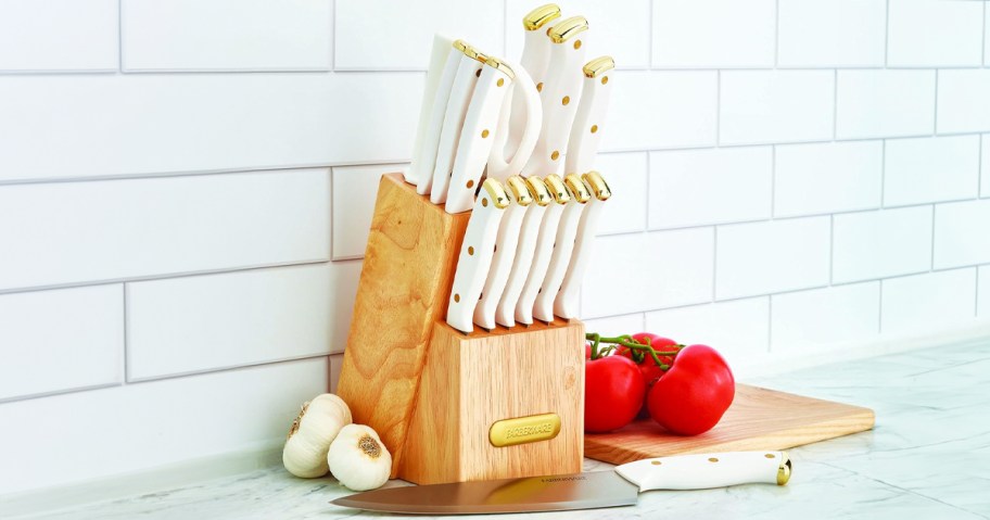 white knife set in kitchen block on countertop 