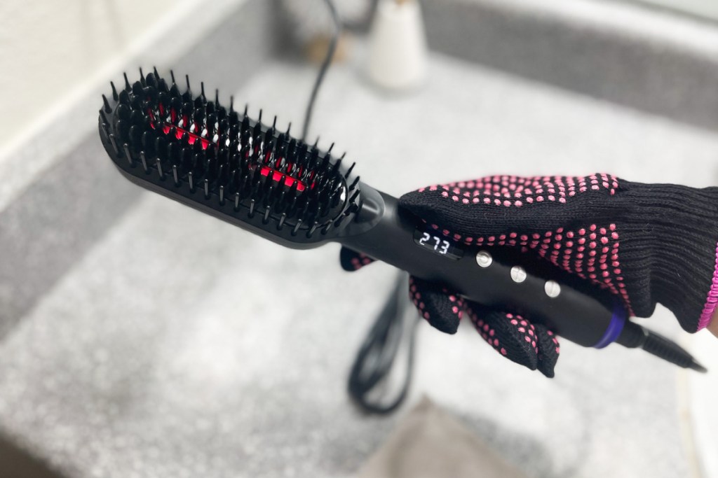 hastar hair brush in hand in glove