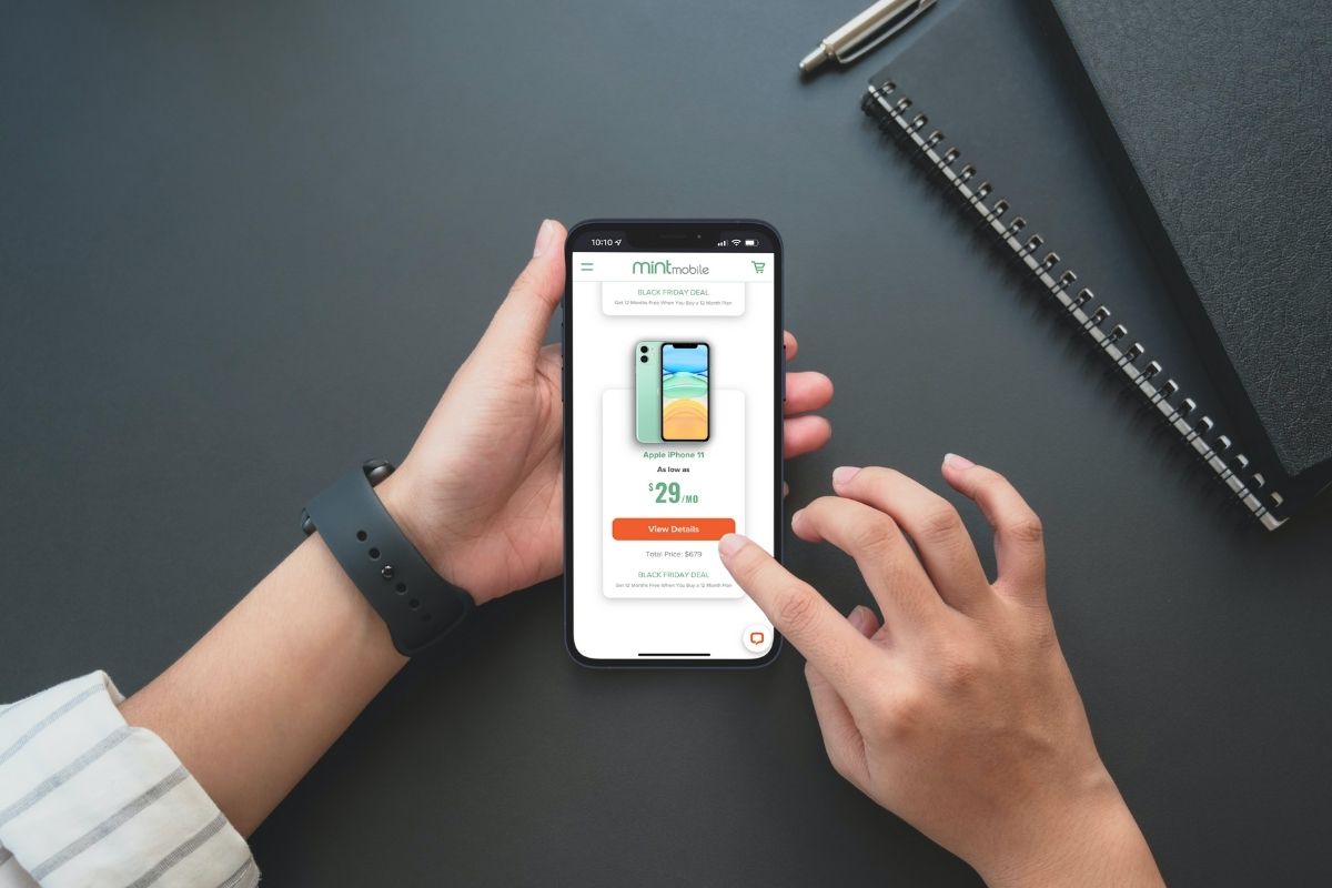 person scrolling through the Mint Mobile website on an iPhone