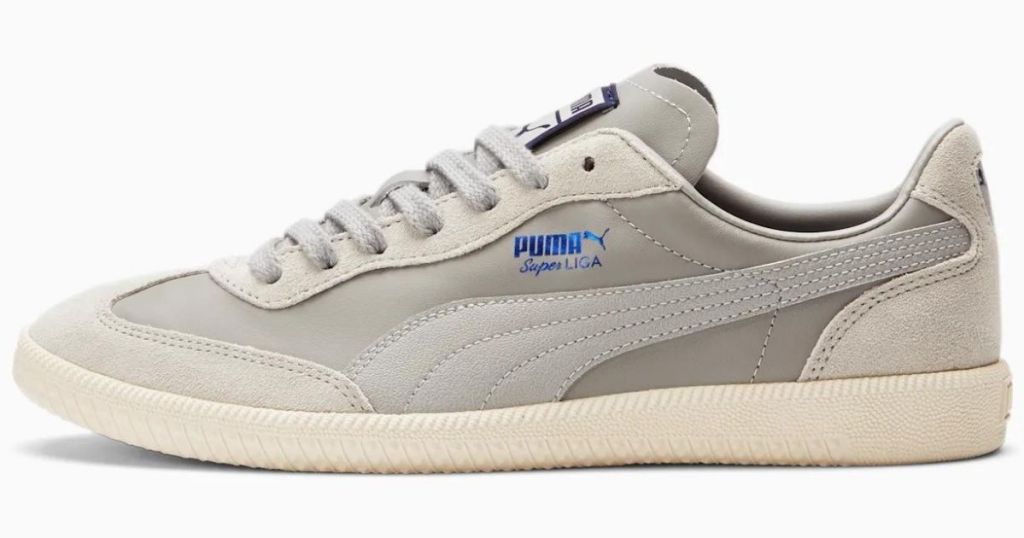 gray puma shoes with blue logo