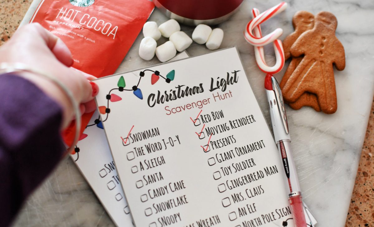 Hang holding a FREE Christmas Light Scavenger Hunt Printable