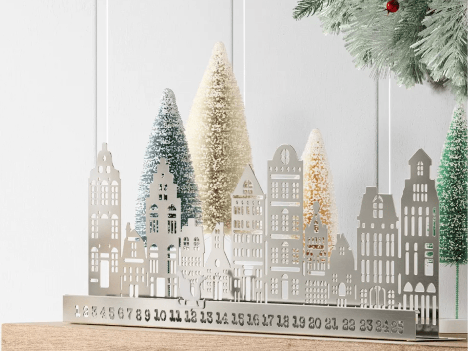 City Scape Advent Calendar on a mantle