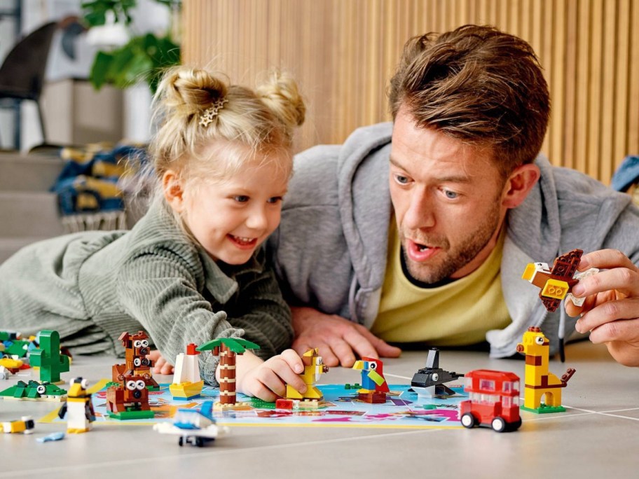 man and daughter playing with a LEGO CLASSIC kit