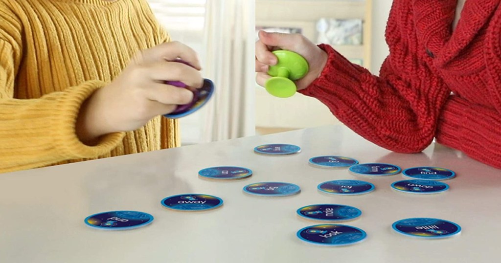 two kids playing a word game