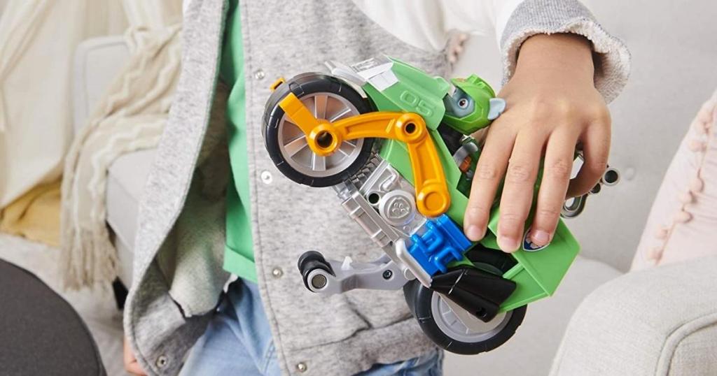 kid playing with paw patrol moto pups rocky's pull back motorcycle