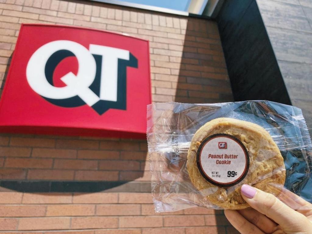 hand holding quiktrip cookie in packaging