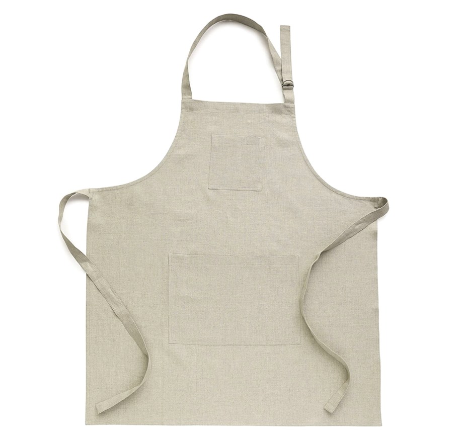 beige apron on white background 