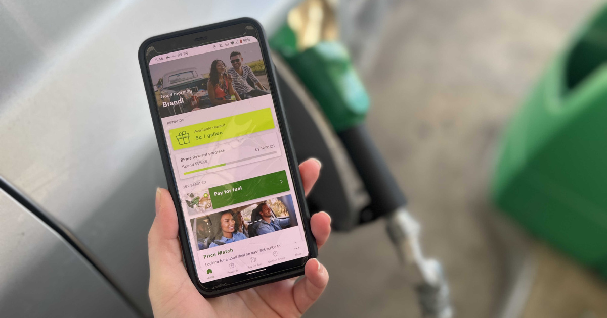 phone screen with BPme app in front of gas pump