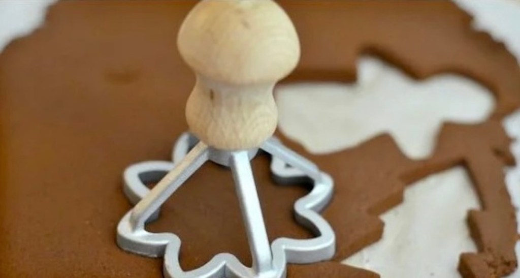 cutting out cookies from dough