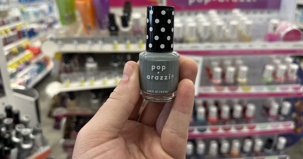 Poparazzi Nail polish in womans hand