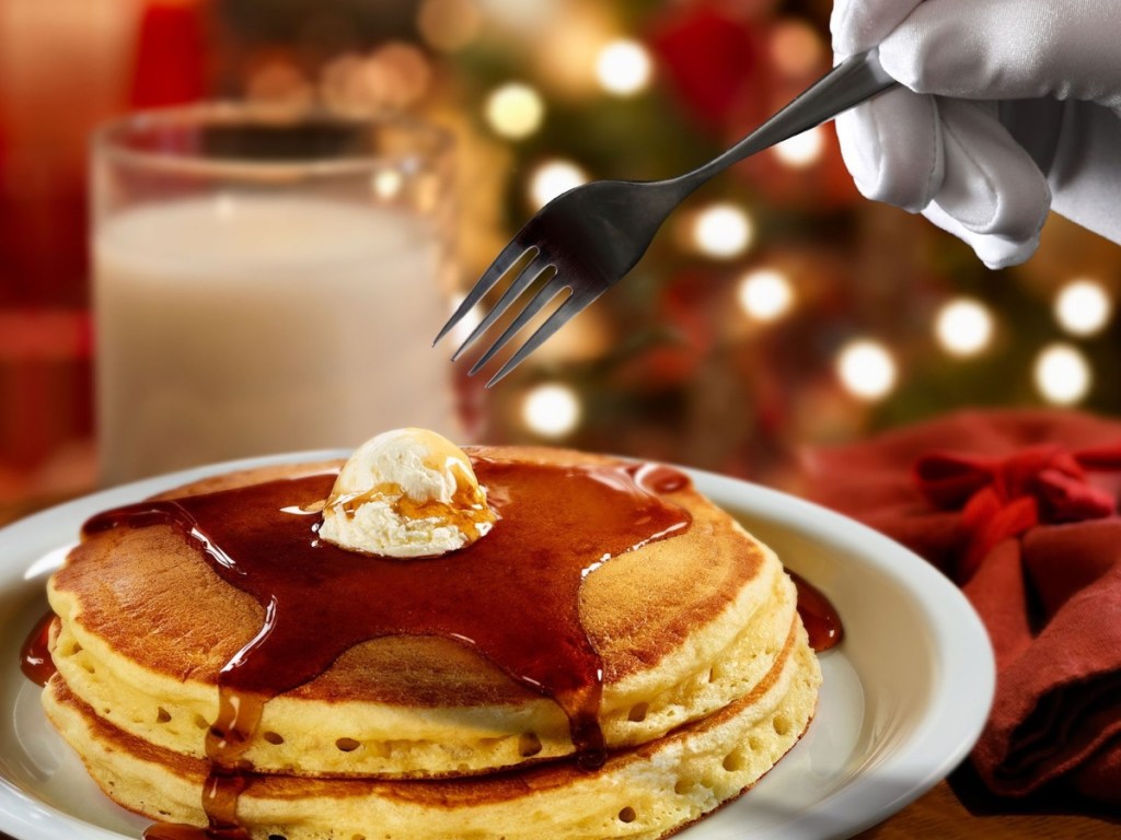 plate of pancakes with milk in a glass