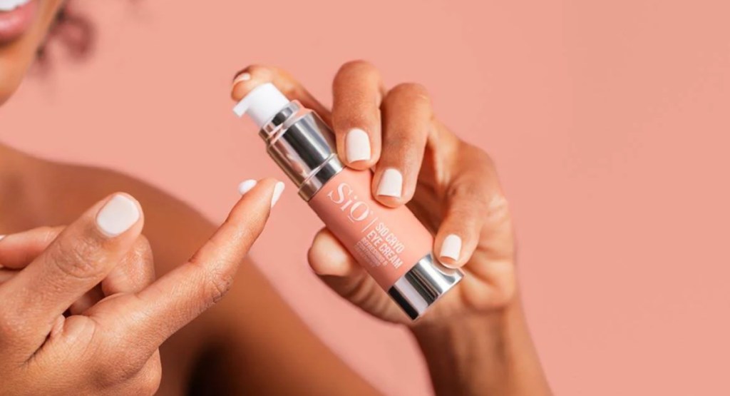 eye cream on hands