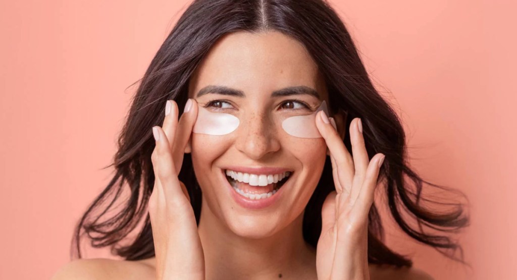 woman with eye patches