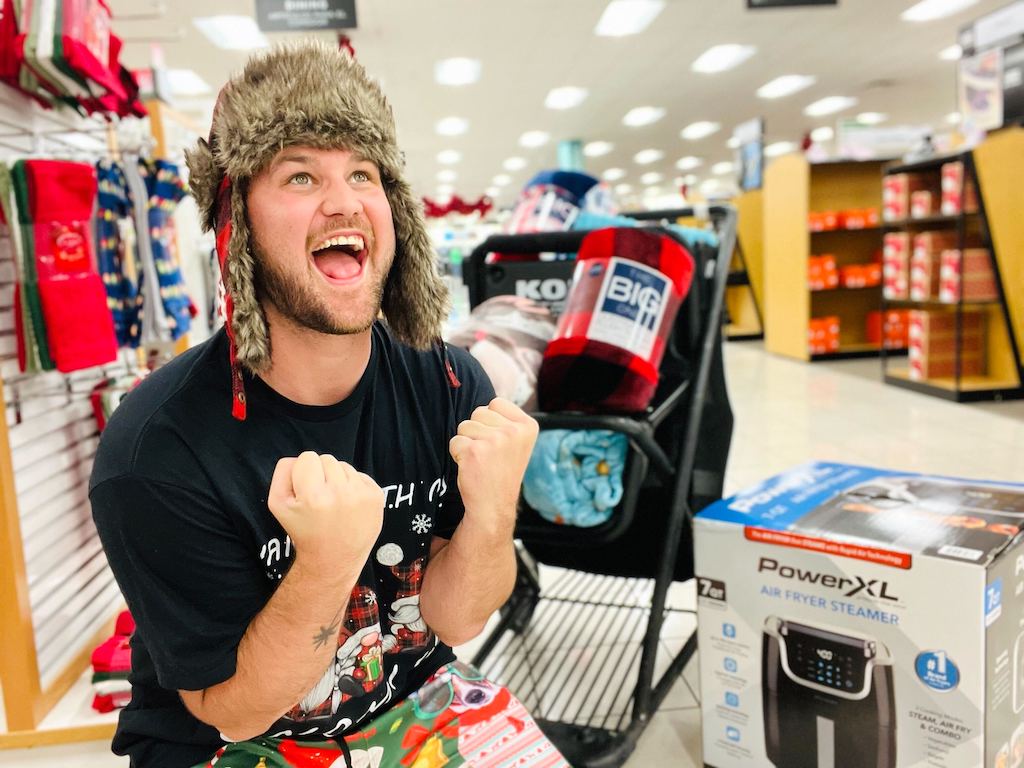 man inside Kohl's excited about deals 