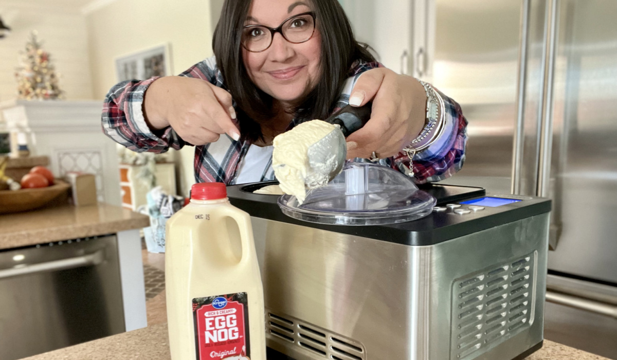 woman holding a scoop on eggnog ice cream