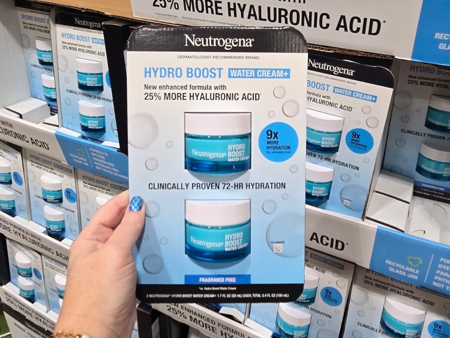 hand holding a Neutrogena Hydro Booster Water Cream 2-Pack at Costco