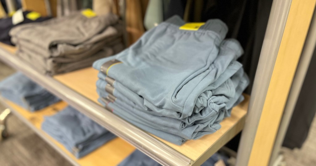 men's gym shorts on shelf 