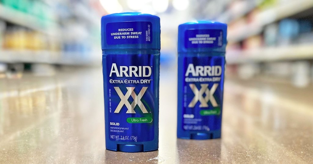two sticks of arrid deodorant on store floor