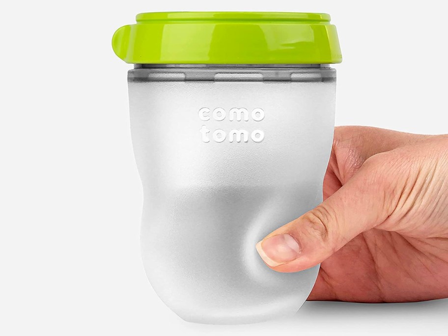 hand squeezing comotomo baby bottle