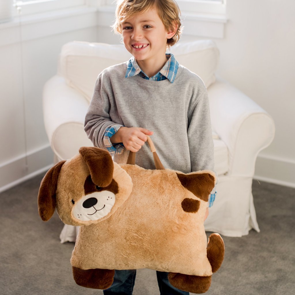 boy holding Dog Pillow