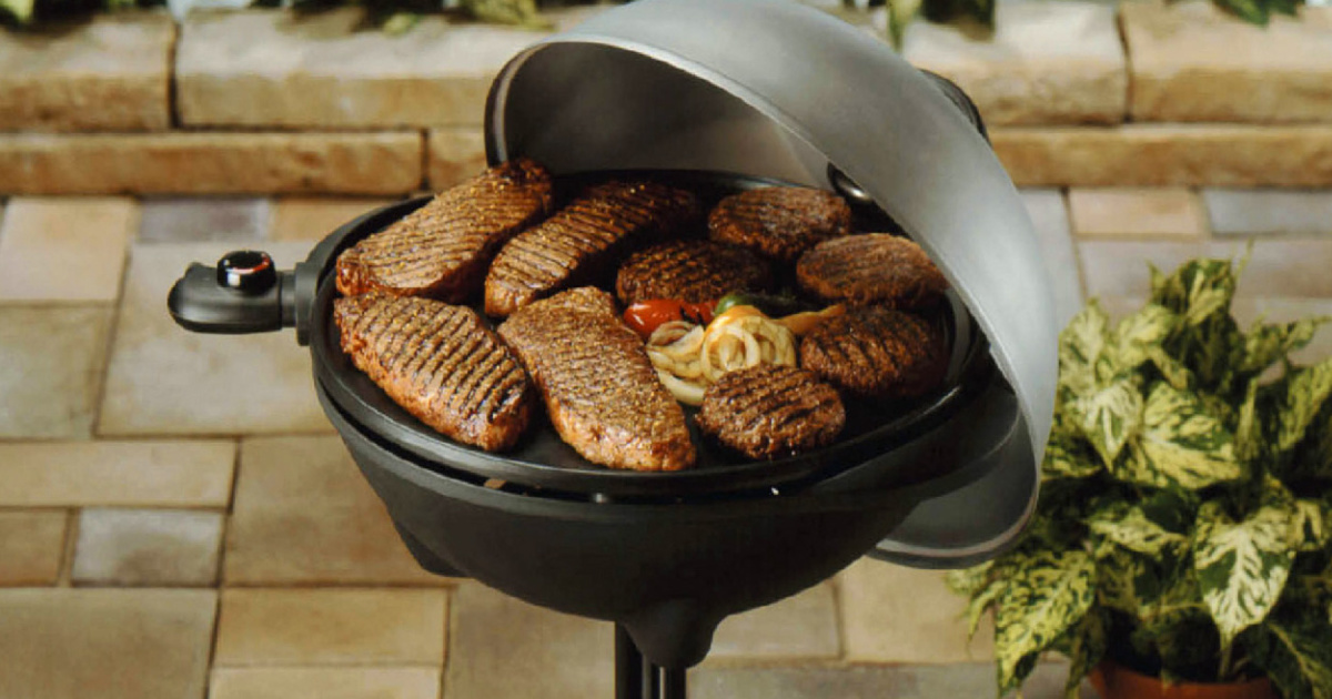 meat and veggies on outdoor grill