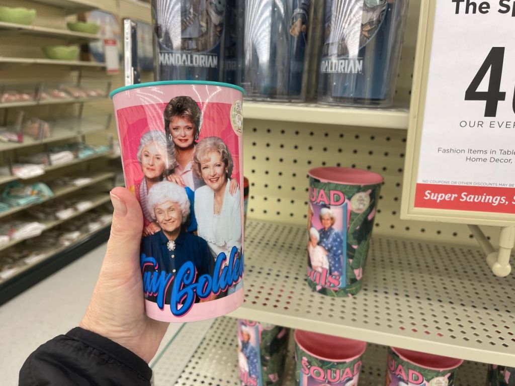 hand holding a Golden Girls Stay Golden Cup