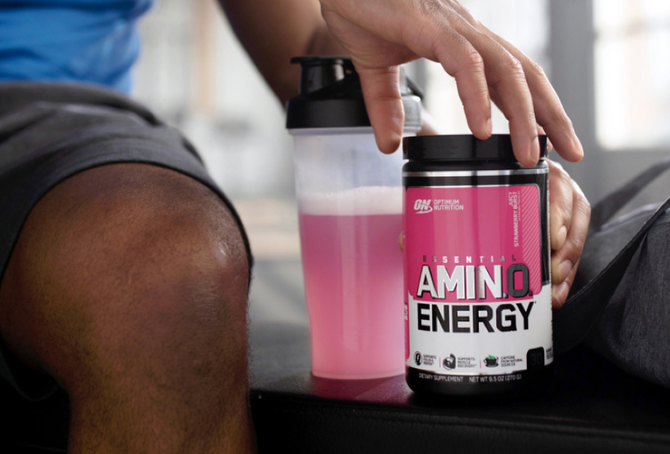 hand holding bottle of Optimum Nutrition Amino Energy