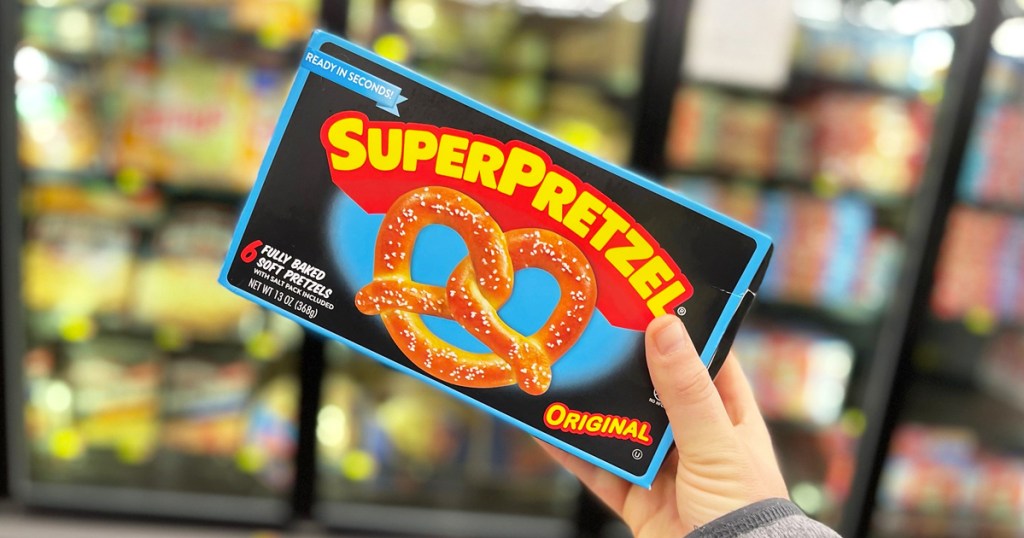 hand holding box of superpretzels