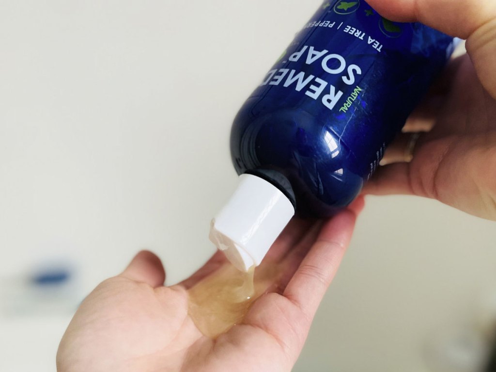 pouring bottle of body wash