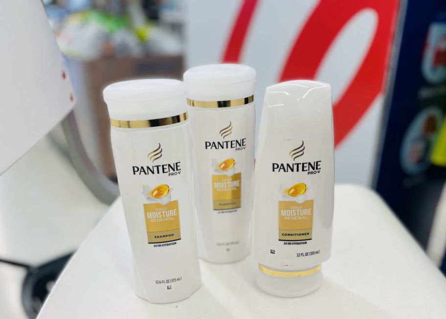 three bottles of Pantene