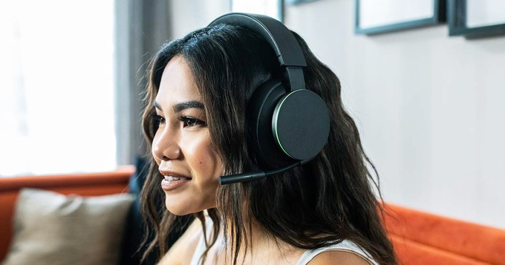woman wearing a black xbox headset
