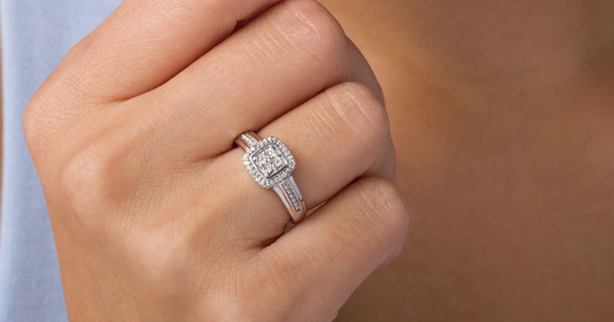 hand with a ring on it