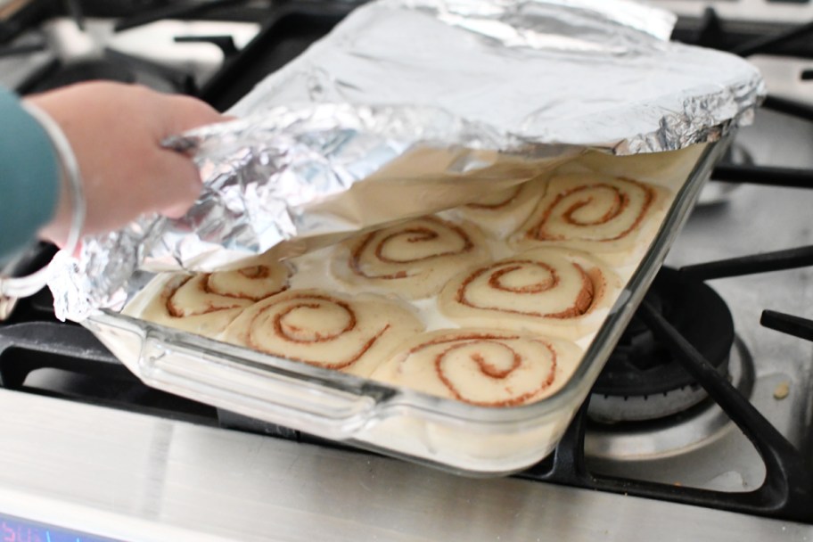 adding foil to cinnamon rolls
