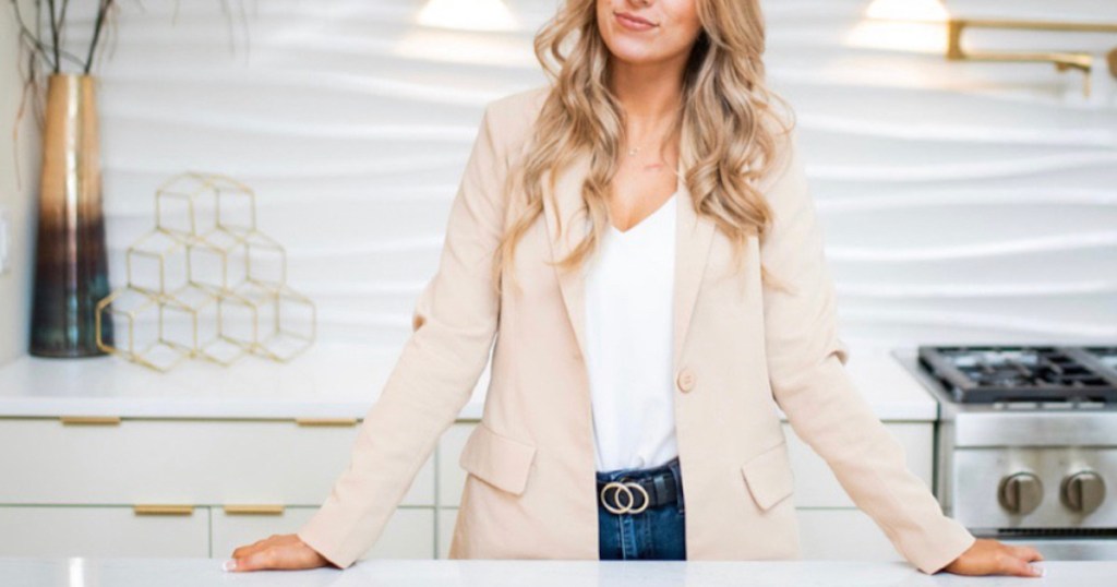 woman wearing notch collar blazer dupe standing in kitchen