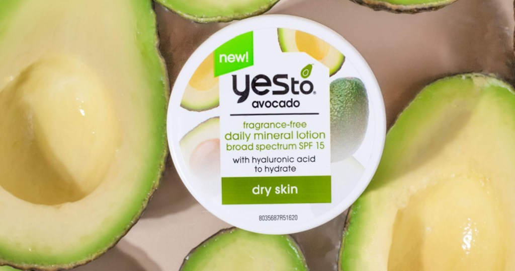 avocado lotion in a pile of avocados