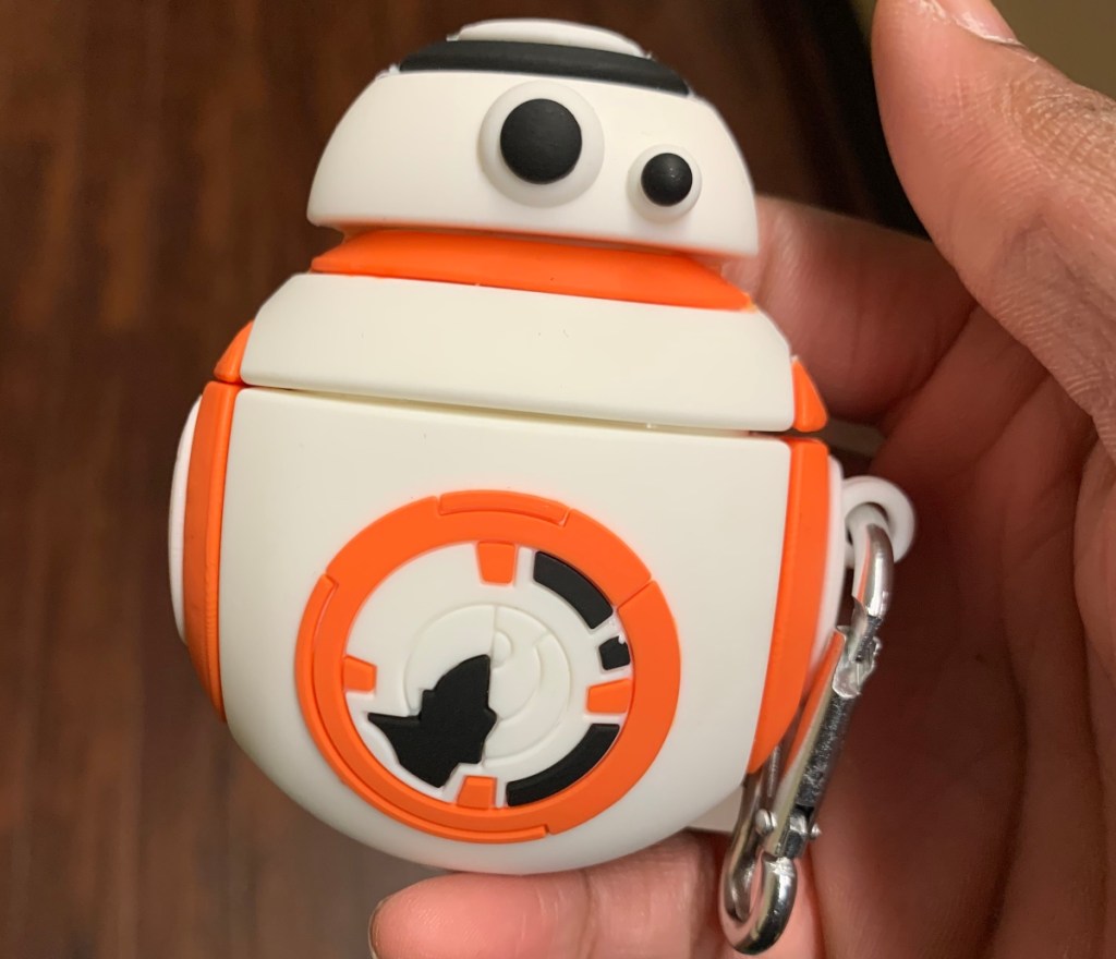 hand holding BB8 Airpods case