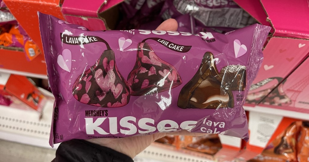 holding a bag of lava cake kisses