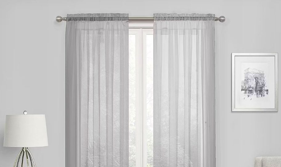 sheer curtains covering a living room window