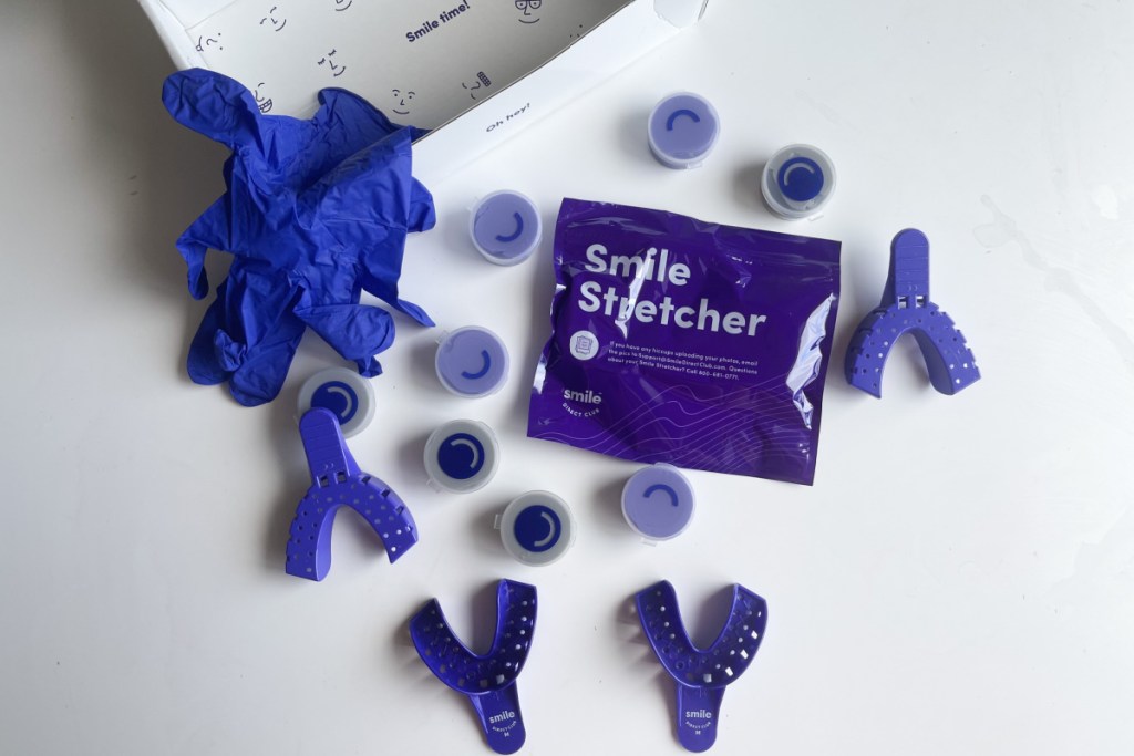 smile direct club putty and gloves on table