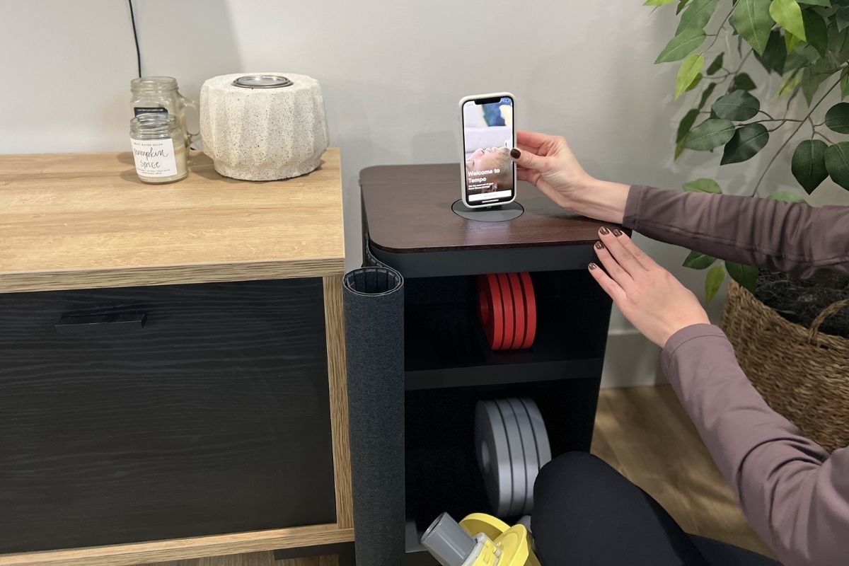 setting phone on top of Tempo Move cabinet