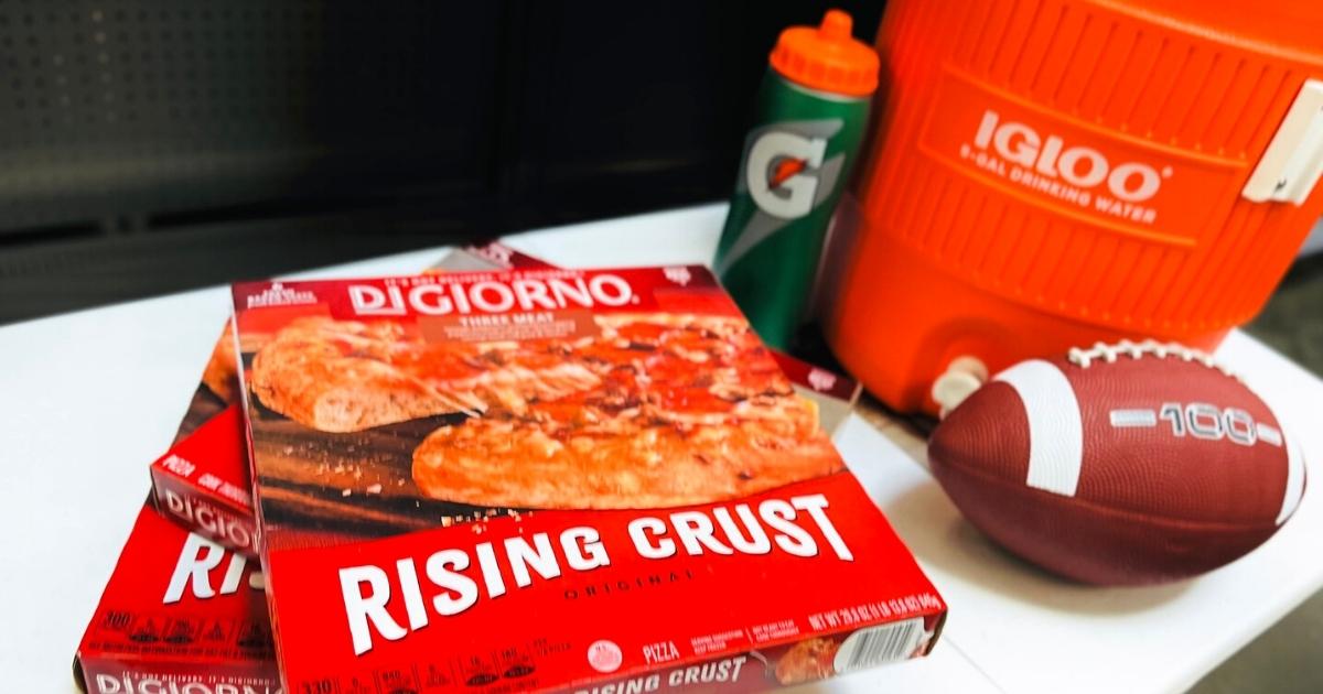 Digiorno Rising Crust pizzas and cooler and football on table