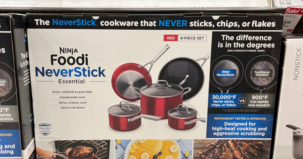 red cookware in box on shelf 