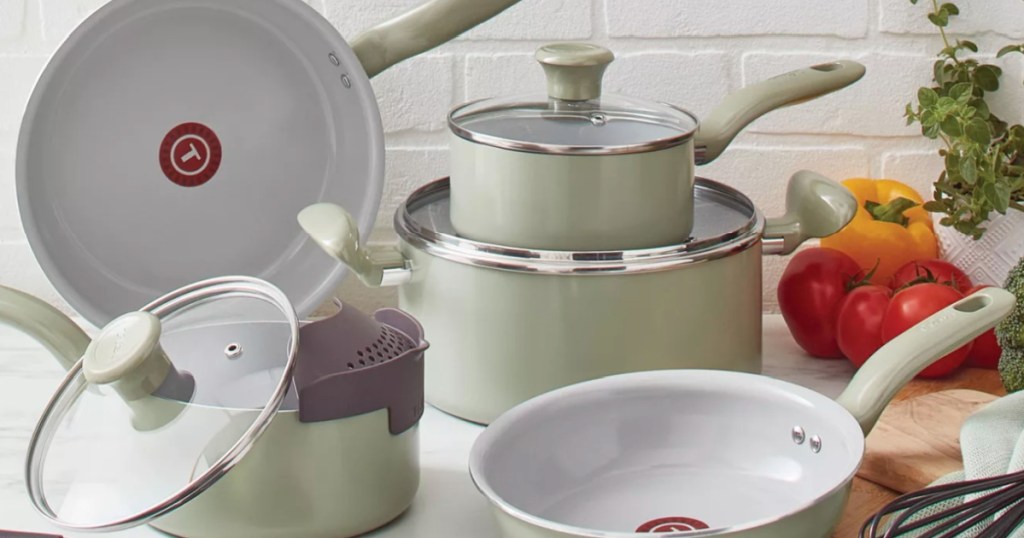 light green pots and pans on counter