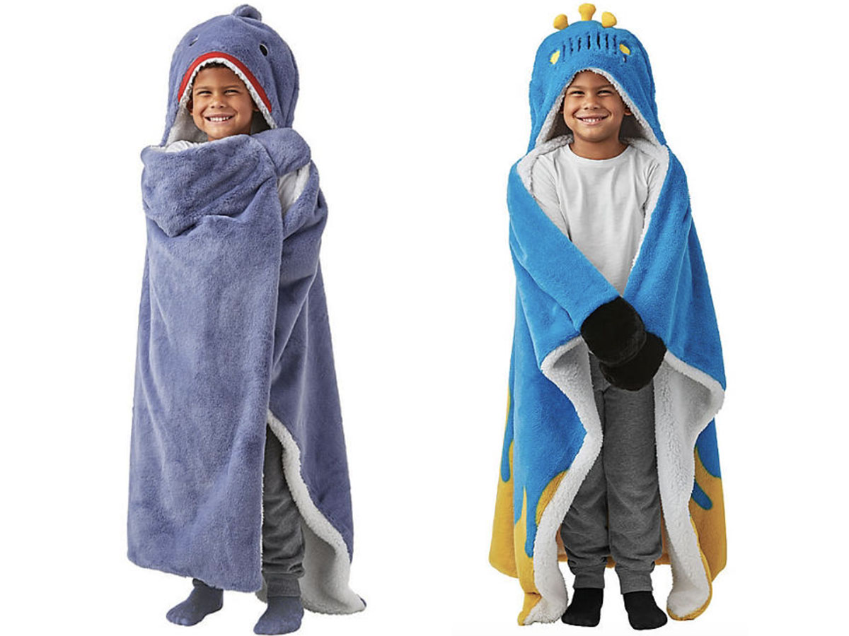 kids wearing shark and truck hooded towels