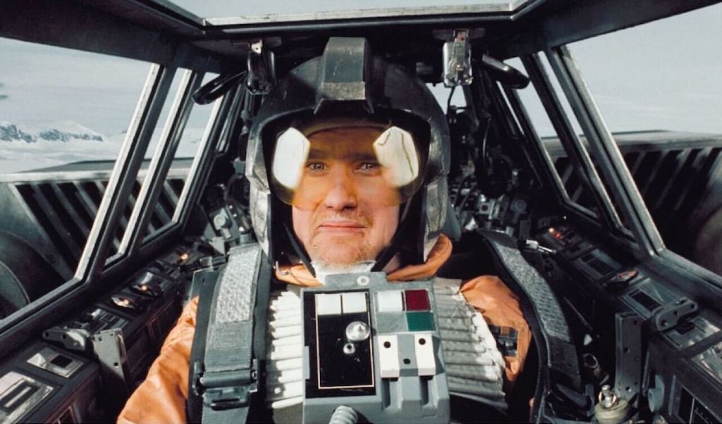 man with helmet on in fighter jet